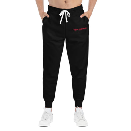 Black Togetherhood logo joggers front view.