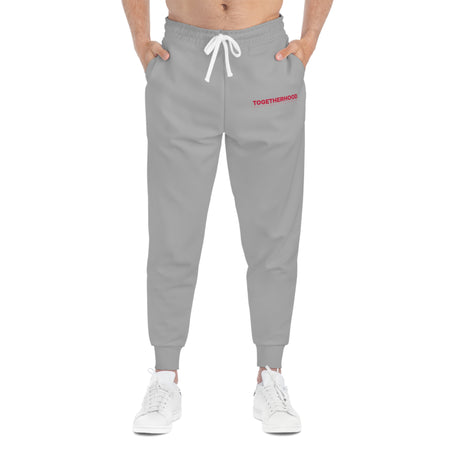 Gray Togetherhood logo joggers front view.