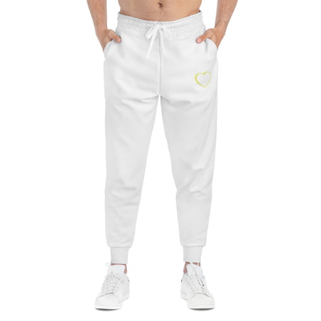 Yellow logo white joggers front view.